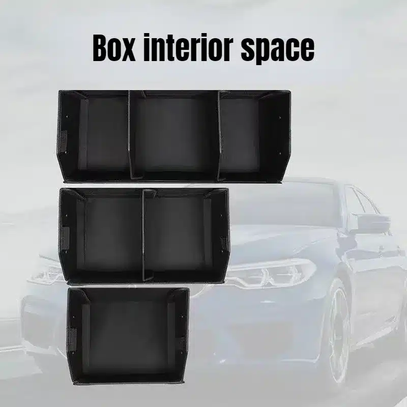 Schwarze Aufbewahrungsboxen vor Auto
